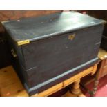 A late 19th century and later black painted metal bound pine hinge top tool chest, having end