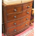 A 19th century mahogany bowfront chest of two short over three long drawers (supports reduced in