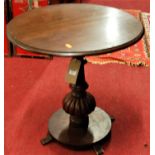 A Victorian mahogany circular fixed top low pedestal tripod occasional table (with alterations),