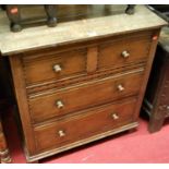 A contemporary moulded oak chest of two short over two long drawers, width 76cm