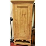 A stained pine single door wardrobe, width 86.5cm