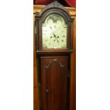 An early 19th century provincial oak longcase clock, having an arched moon-phase dial, twin