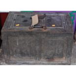 An early 20th century cast iron floor safe, having hinged door, twin carry handles, with key, 54 x