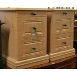 A pair of contemporary laminate three drawer bedside chests, width 44cm