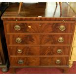 An early 19th century flame mahogany and satinwood strung square front chest, of four long graduated