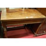 A 19th century mahogany fold over tea table, raised on turned supports, width 91.5cm