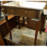 A 19th century oak plank top single drawer side table, raised on slender cabriole supports, width