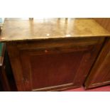 A Victorian stained pine single door side cupboard (lacking supports), width 93cm