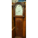 An early 19th century oak longcase clock, the painted arched dial signed Jonathan Brown of