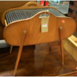 A 1950s walnut veneered tambour topped sewing table, with twin carry handles, width 57cmCondition