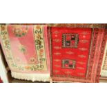 A Persian woollen small red ground Bokhara rug; together with a Chinese pink ground Superwash