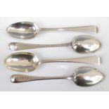 A set of three George III silver dessert spoons, in the Old English pattern with bright cut