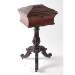 An early Victorian rosewood pedestal teapoy, of waisted sarcophagus form, the hinged cover opening