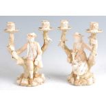 A pair of late 19th century Worcester porcelain candelabra figures after Watteau, the male and