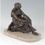 A late 19th century French bronze of the Muse of Music, in seated pose with harp behind her, brown