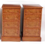 A pair of contemporary burr oak and crossbanded bedside chests, each fitted with four graduated