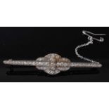 An Art Deco white metal diamond lozenge shaped bar brooch, comprising 51 graduated Old European