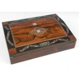 A Victorian rosewood and mother of pearl inlaid writing box, having a hinged cover and fall, opening