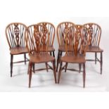 A set of four Victorian elm seat, ash and fruitwood stickback farmhouse kitchen chairs; together