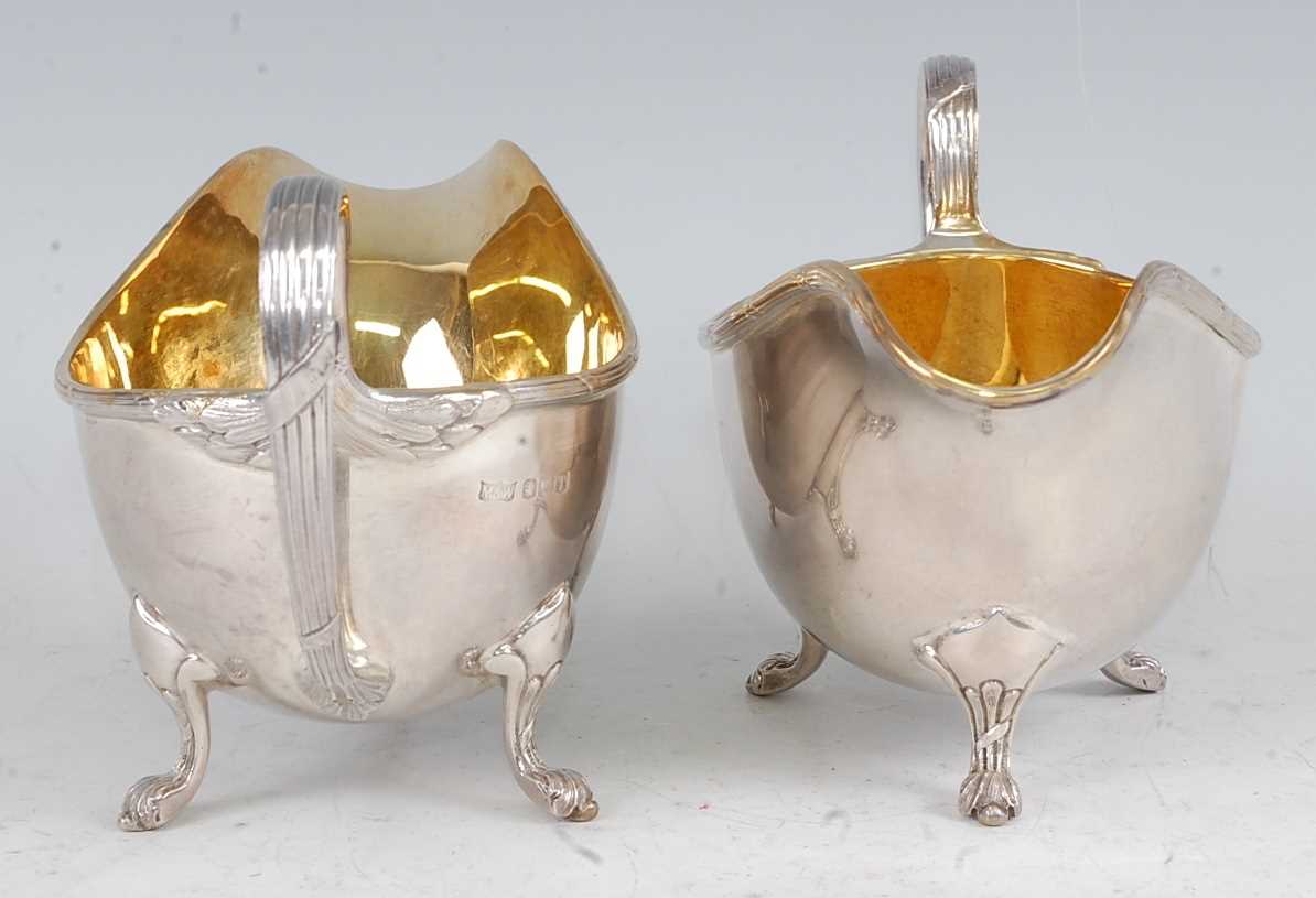 A pair of Mappin & Webb silver sauceboats, each having gilt-washed interiors, reeded edges, and on - Image 3 of 5