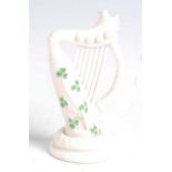 A second period Belleek Harp, decorated with shamrock and heightened in green enamels, black mark