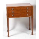 A mid-20th century Mappin & Webb mahogany three-drawer canteen table, containing a near-full