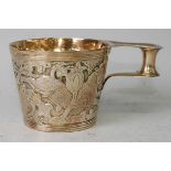 A silver gilt replica of the Vapheio Cup, with scroll and lug single handle, 10.2oz, maker