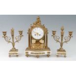 A French gilt brass and marble three-piece clock garniture, the clock having an unsigned convex