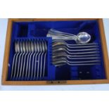 An Edwardian silver part cutlery suite, in the Hanoverian pattern, all housed in a fitted oak