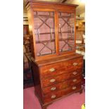 A George III mahogany secretaire bookcase, the upper section having twin astragal glazed doors