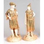 A pair of Hadley Worcester male and female Bringaree Indian figures, each embellished in gilt