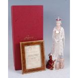 A Bronte porcelain figurine of Her Majesty Queen Elizabeth II, commemorating the state opening of