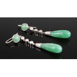 A pair of white metal, jadeite and diamond drop earrings, each comprising a 23.2mm jadeite drop