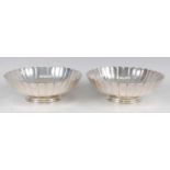 A pair of silver footed bowls, each of lobed circular form, 42.2oz, maker D&J Wellby Ltd, London