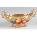 A Royal Worcester twin handled footed bowl, decorated with fruit on a mossy bank by Horace Price,
