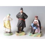 A set of three Russian bisque porcelain peasant figures by the Gardener Porcelain Factory of Moscow,