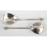 A pair of silver seal-top spoons, in the 16th century style, each annotated to the hexagonal