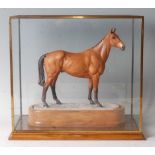 A Royal Worcester model of Arkle, modelled by Doris Lindner, model No.34, h.22cm (excluding plinth),