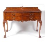 A walnut and burr walnut four drawer servery, in the mid-18th century style, the crossbanded top