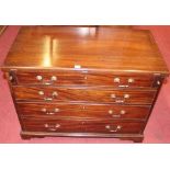 A George III and later mahogany chest, having a fold-over top above four long graduated drawers with