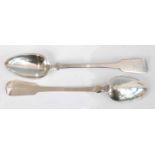 A pair of George IV silver stuffing spoons, in the Fiddle pattern, each having armorial engraved
