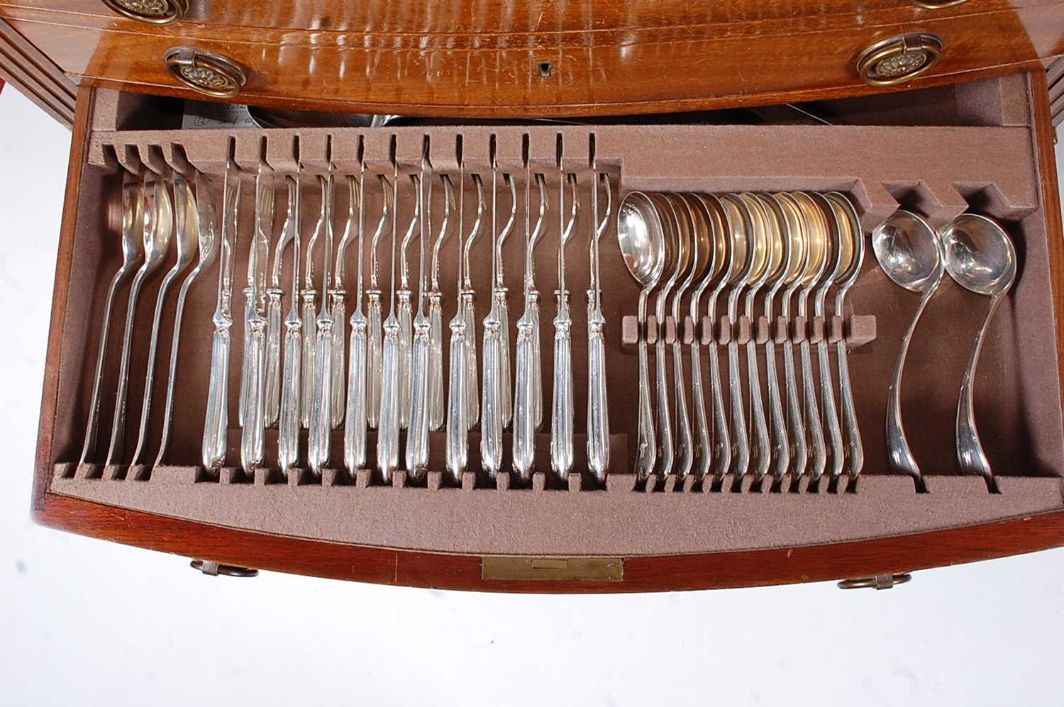 A mid-20th century Mappin & Webb mahogany three-drawer canteen table, containing a near-full - Image 6 of 9