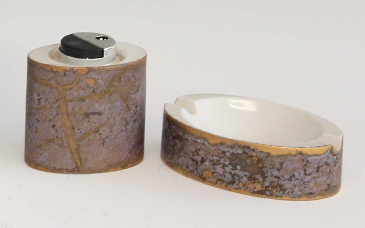 A Rosenthal studio-line ceramic table lighter by H. Dresler, of oval form, heightened in gilt,