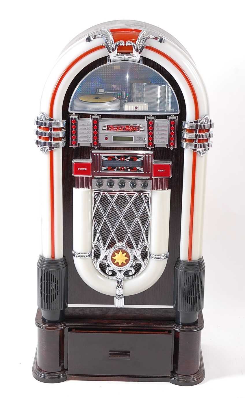 A Steepletone CD Rock i-1CD retro style illuminating floor standing jukebox CD player on stand, with