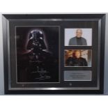 Star Wars, a 31 x 23cm colour photograph of Darth Vader, signed by the actors James Earl Jones and