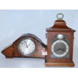 An Art Deco walnut and rosewood crossbanded mantel clock having a silvered dial with Arabic numerals