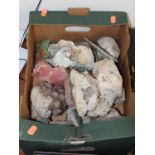 A box of assorted rock specimens and geodes