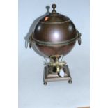 An early 20th century copper samovar of globular form having twin ring handles on stepped plinth and