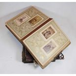 A late Victorian leather bound photograph album, the contents mainly being family portraits;