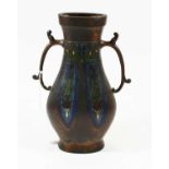 A modern bronzed and cloisonne enamelled twin handled vase of slender baluster form with impressed